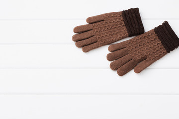 gloves on white wooden background