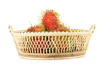 Fototapeta na wymiar rambutan in basket isolated on white background