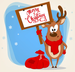 Funny reindeer standing near bag with presents and holding placard with greetings