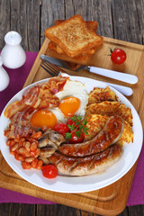 full english breakfast on white palte