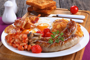 full english breakfast on white palte