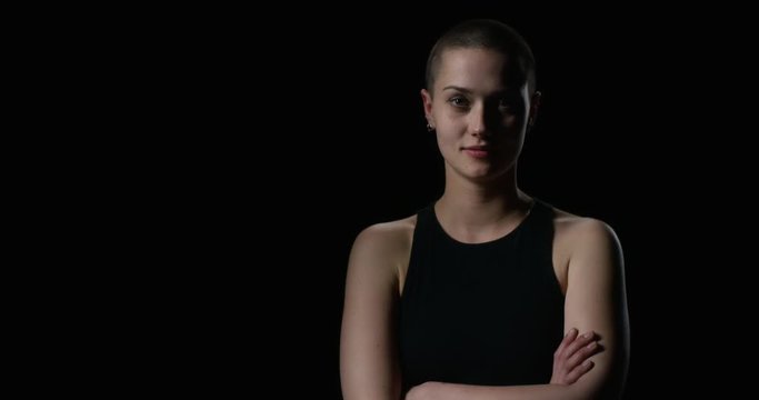 Young short haired woman turns into camera direction