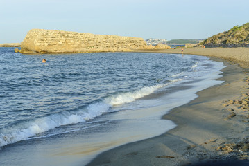 remains of the port of the Greek and Roman ruins of the archaeological place of Ampurias, on the brava coast in Spain.