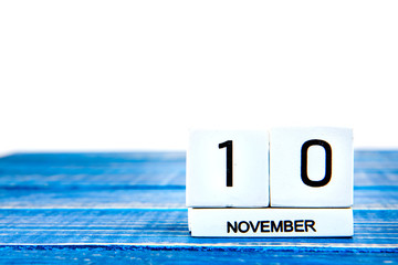 November 10th. Image of november 10th calendar on blue background. Veterans day. Empty space for text.