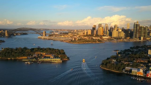 4k aerial video of Sydney Harbour, with view of Harbour Bridge, Opera House and skyline of CBD