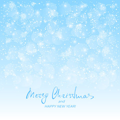 Text Merry Christmas and Happy New Year on blue snowy background