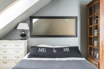 Mirror above king-size bed