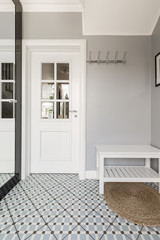 Patterned floor in bright anteroom