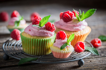 Sweet raspberry cupcake made of cream and fruits