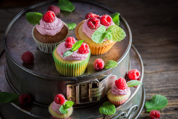 Sweet raspberry muffin made of cream and fruits