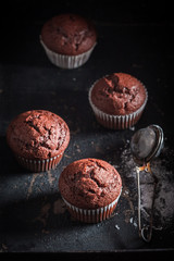 Delicious and homemade chocolate muffin with caster sugar