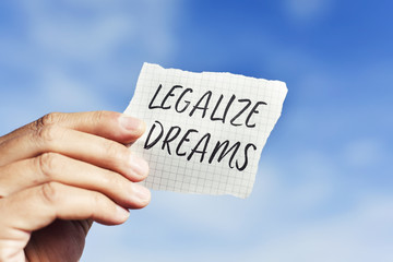 text legalize dreams in a piece of paper