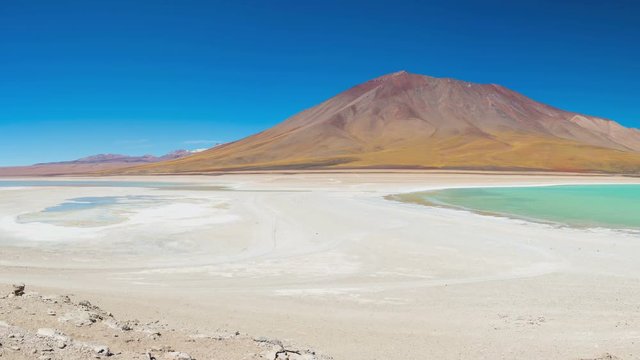 Laguna Verde Panorama, the Andes between Bolivia and Chile. The outstanding Green Lagoon, a frozen salt lake, travel destination in Bolivia. Snowcapped Licancabur Volcano, 5920 m.