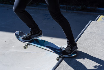Fototapeta na wymiar Skater Girl in urban Skate Park in Innsbruck Austria