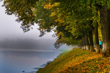 River in the morning mist.  Autumn cityscapes