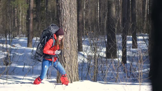Hiker walking through a deep snow.