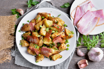 Cooked fried potato with bacon