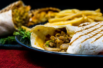 beef tacos served with golden French fries