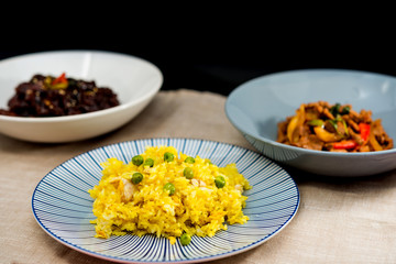 Homemade Chinese fried rice with vegetables and fried eggs