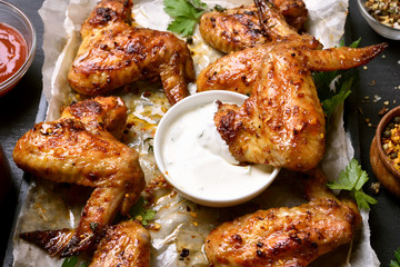 Fried chicken wings with white sauce