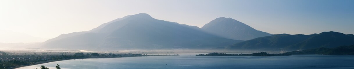 Morning sunrise over the mountain range and the sea