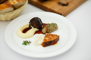 Tasty paste served on white plate