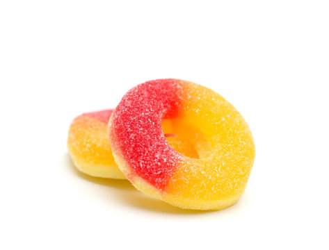 Peach Gummies On A White Background