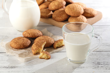 Seasonal cinnamon snickerdoodle cookies with milkin rustic setting