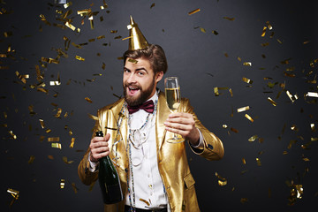 Joyful man drinking a champagne © gpointstudio