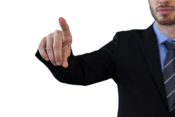 Cropped image of businessman touching index finger on invisible