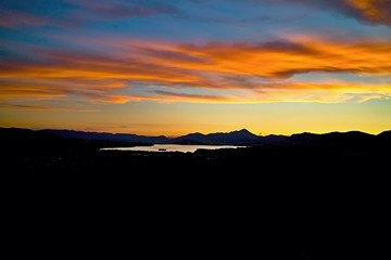 Fototapeta premium A beautiful colorful sky over the Liptovska Mara dam at sunset.