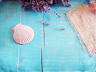 sea shell and lavender on wooden background