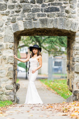 Filipino model in a local park at Autumn time surrounded by lush foliage at daytime