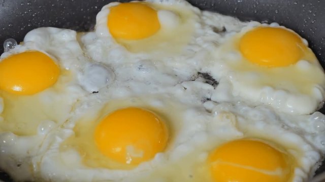 Scrumbled eggs on the frying pan