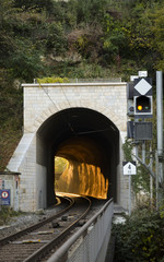 Train tunnel with sun