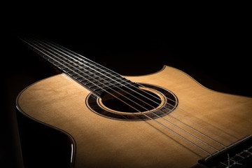 Obraz premium Closeup of a classical guitar low key