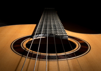 Closeup of a classical guitar low key