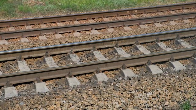 Close View Of Railroad Track Moving At High Speed. Camera moves along railway. 