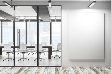 Modern meeting room with empty poster