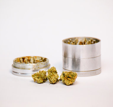 Isolated Cannabis and Grinder