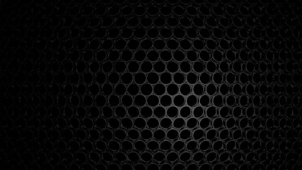 abstract metal net with circle hole pattern on black background.