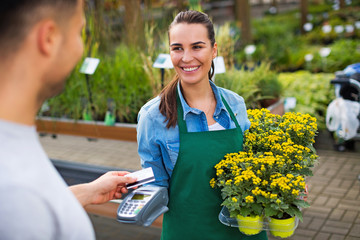 Paying with credit card at garden center

