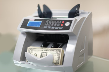 Banknote counter and usd (US dollars) banknotes