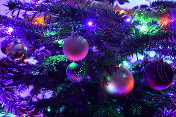 Christmas tree with decoration, colorful lights, close-up