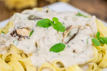Portion of Porcini pasta, selective focus