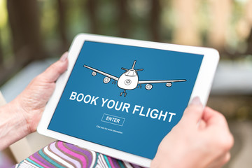 Flight booking concept on a tablet