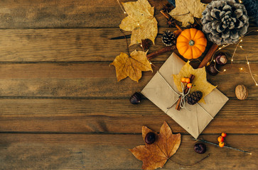 Naklejka na ściany i meble craft envelope with autumn decorations 