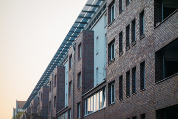 typical berlin apartment complex with brick facade