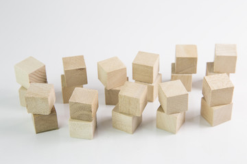 small brown wooden square cubes 