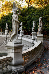Autumn sunset view of the fountain of the twelve months, build in Valentino public park during the 1898 great exhibition of Turin (Piedmont, Italy). Detail of the statue of december